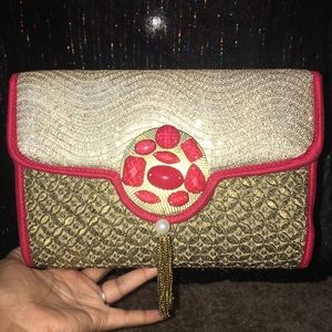 Golden and red clutch.